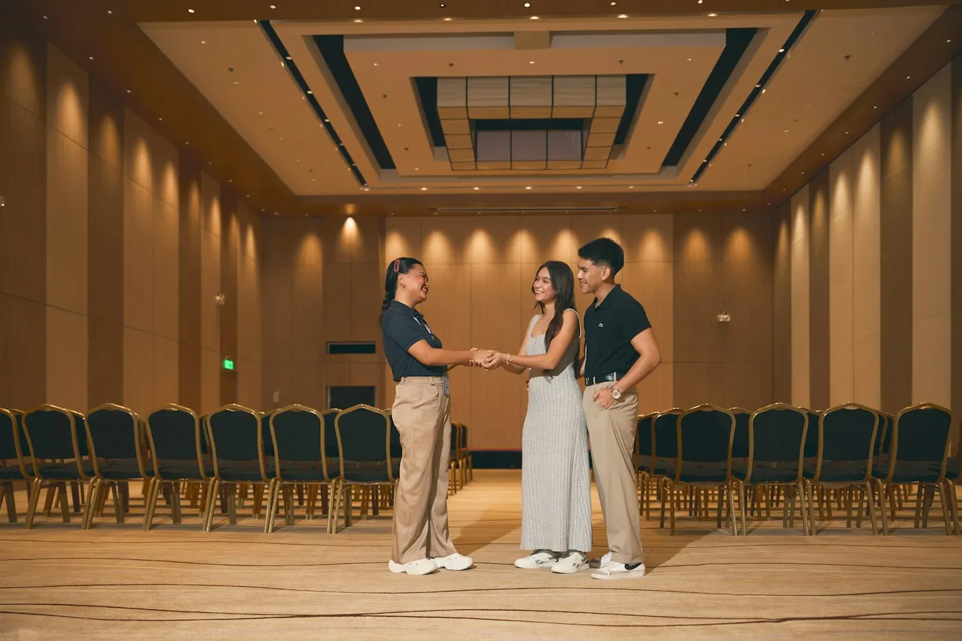 Two executives shaking hands in a meeting room