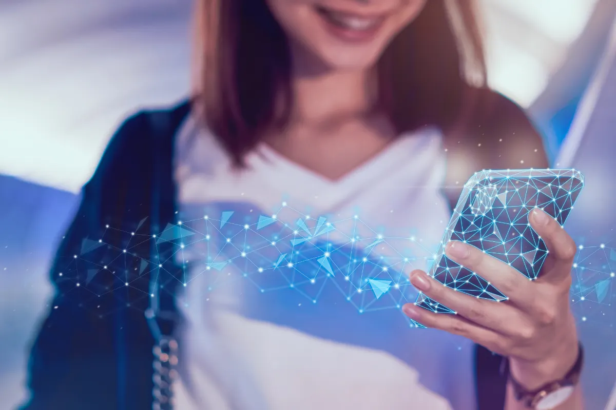 A smartphone displaying an AI chat app interface, held in a person's hand