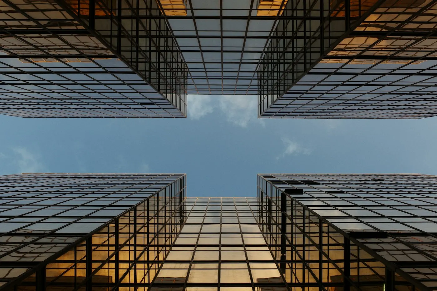 Modern office towers representing corporate finance and dealmaking