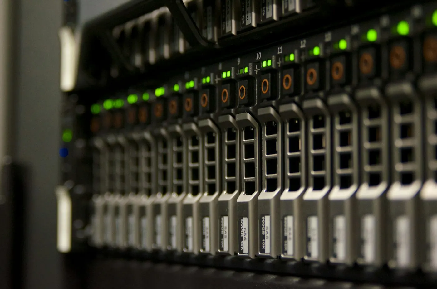 Rows of illuminated servers in a data center
