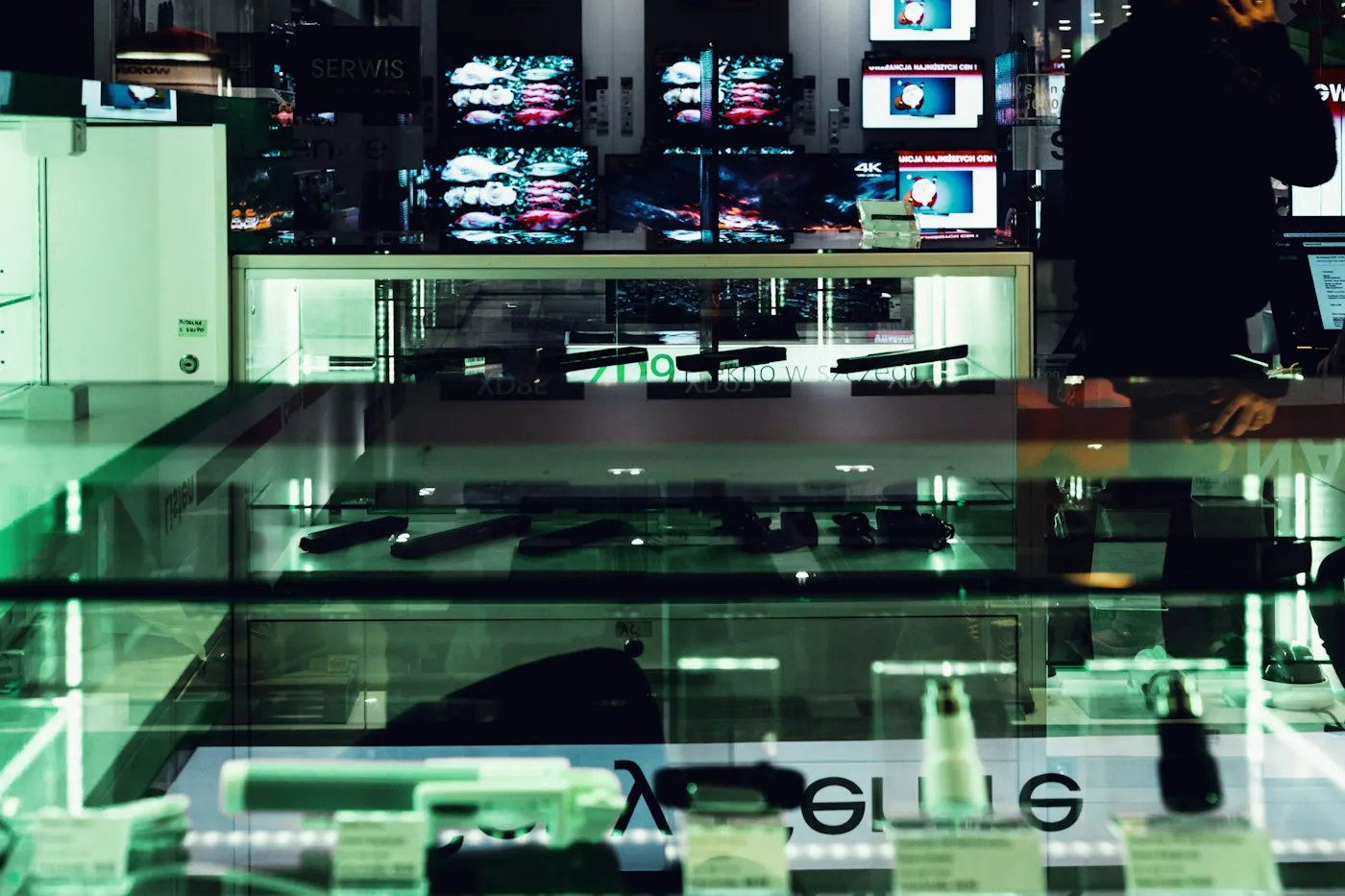 Shelves of electronics products in a retail store