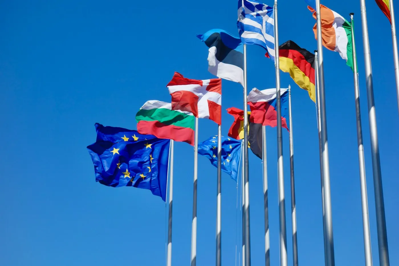 A government building with European Union flags outside