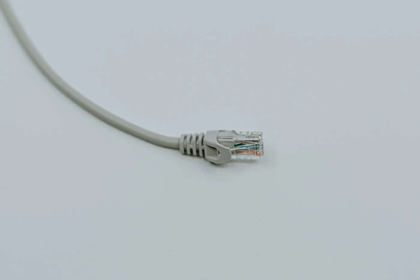 Close-up of an ethernet cable plugged into a router