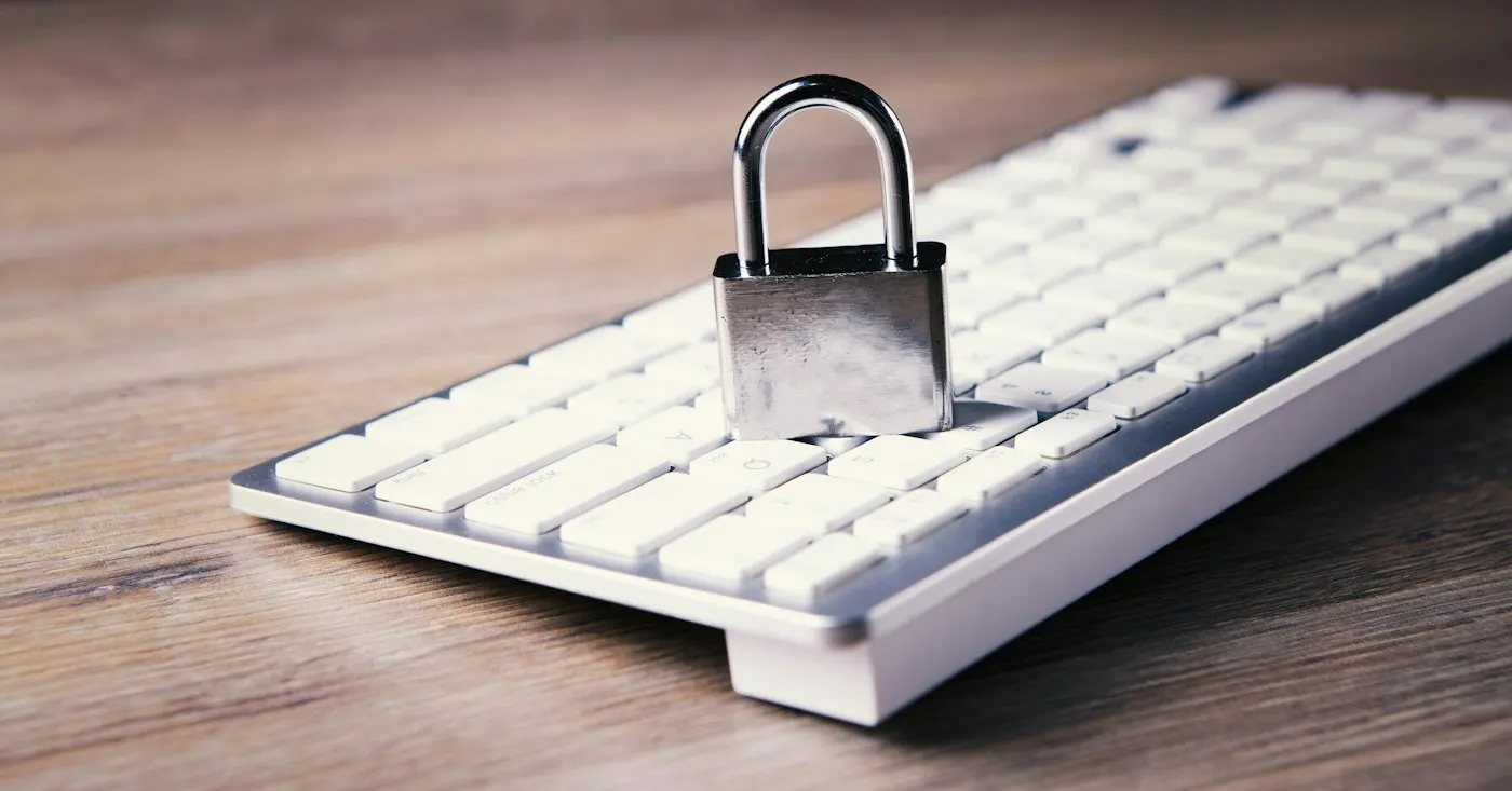 A padlock resting on a computer keyboard symbolizing security