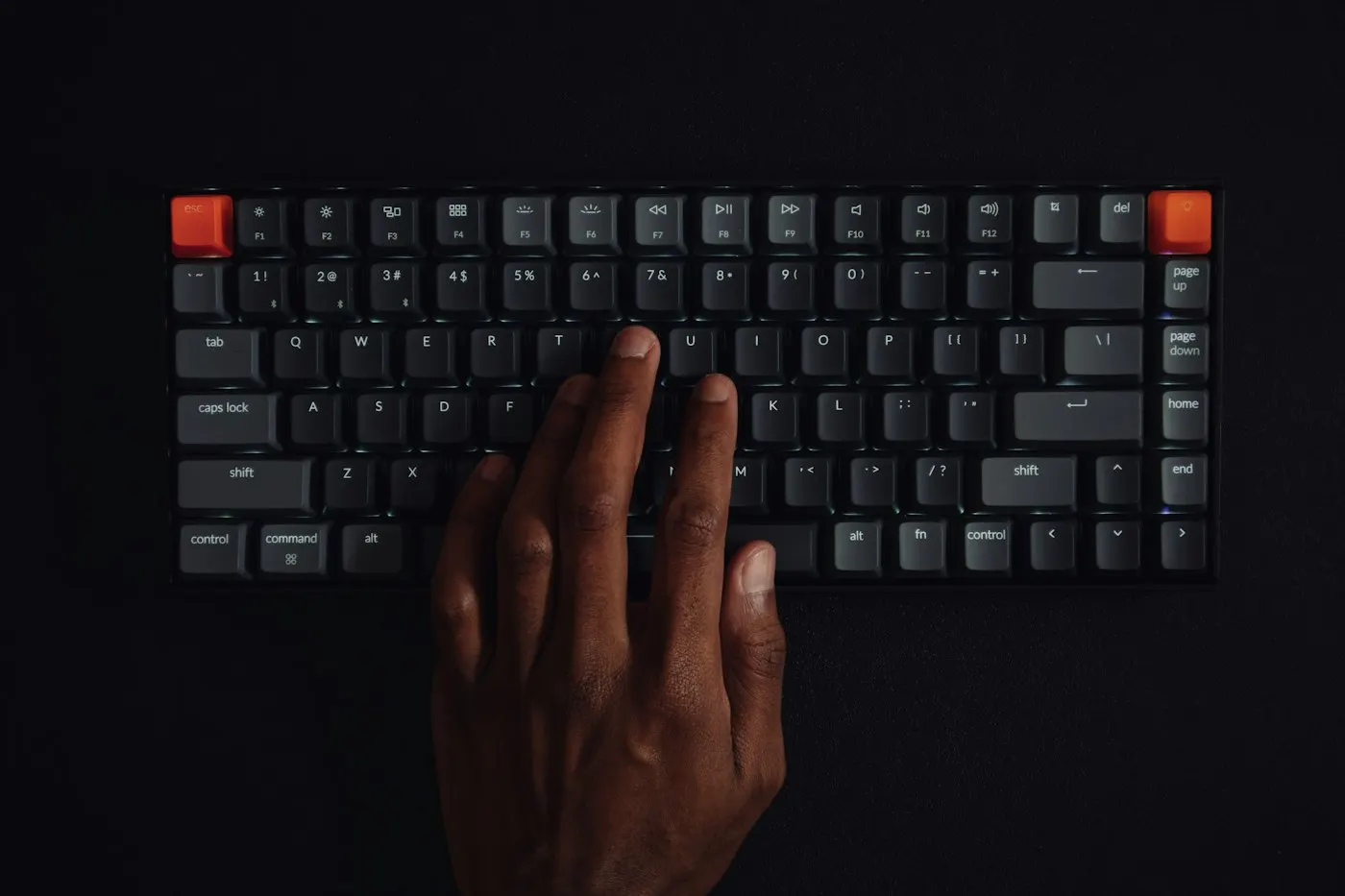 A developer's hands typing on a keyboard
