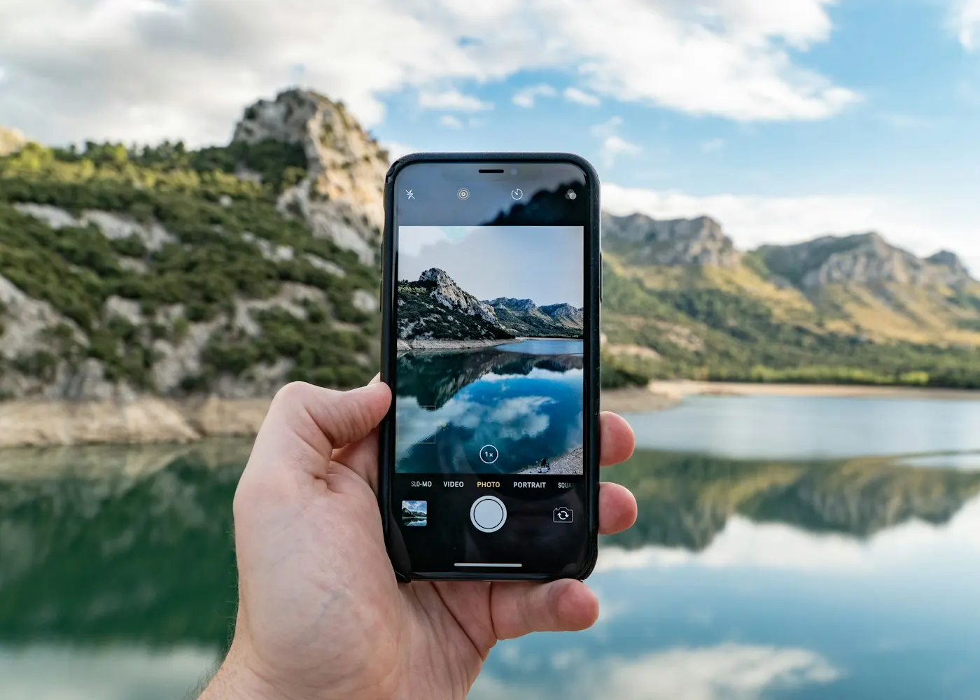 A smartphone displaying a photo gallery app