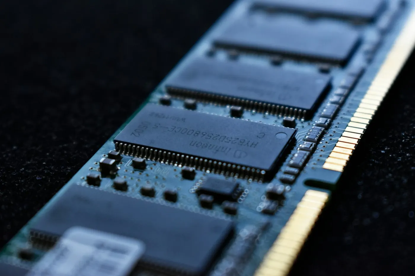 Stack of computer memory modules on a desk
