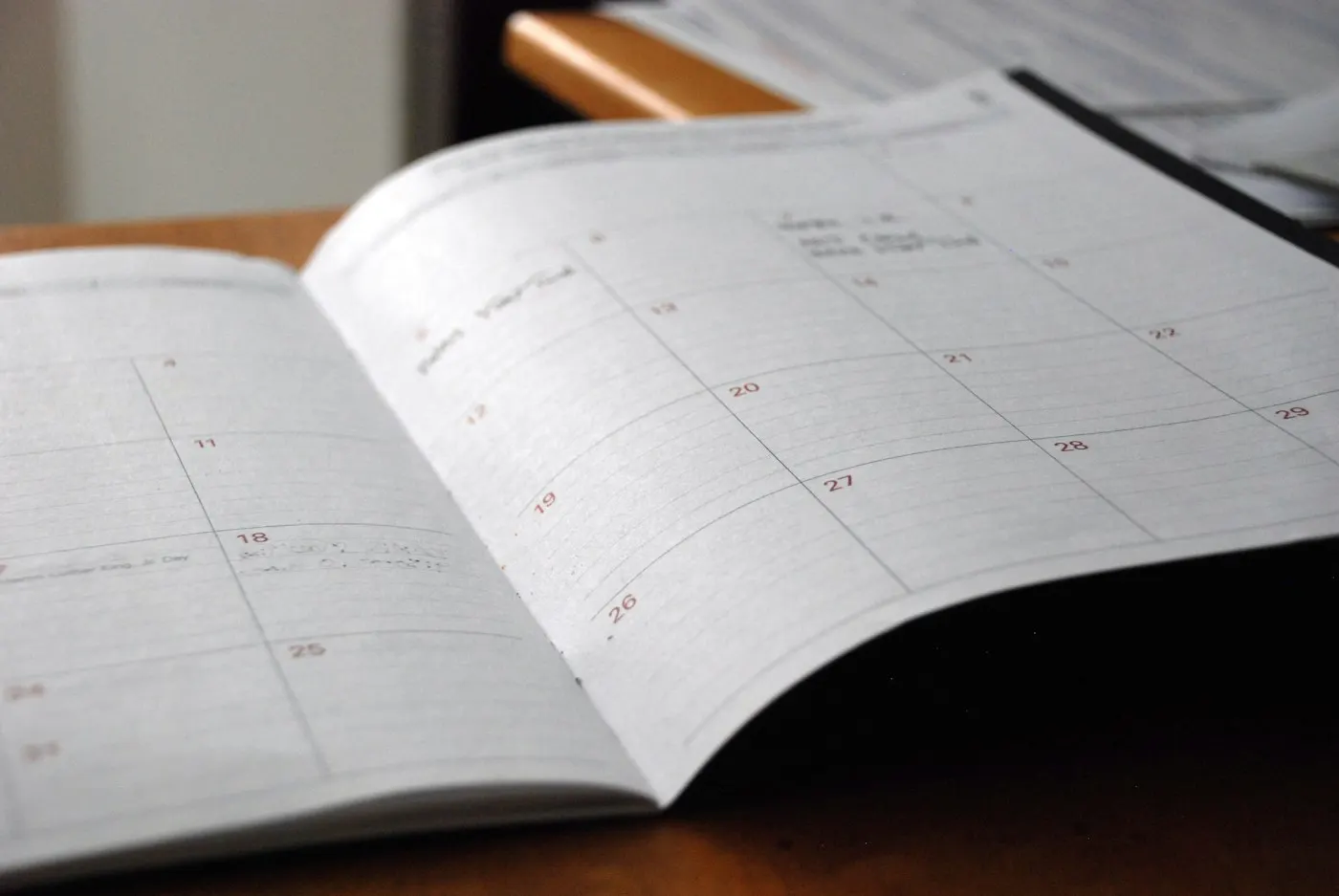 Pages of a calendar representing passing years