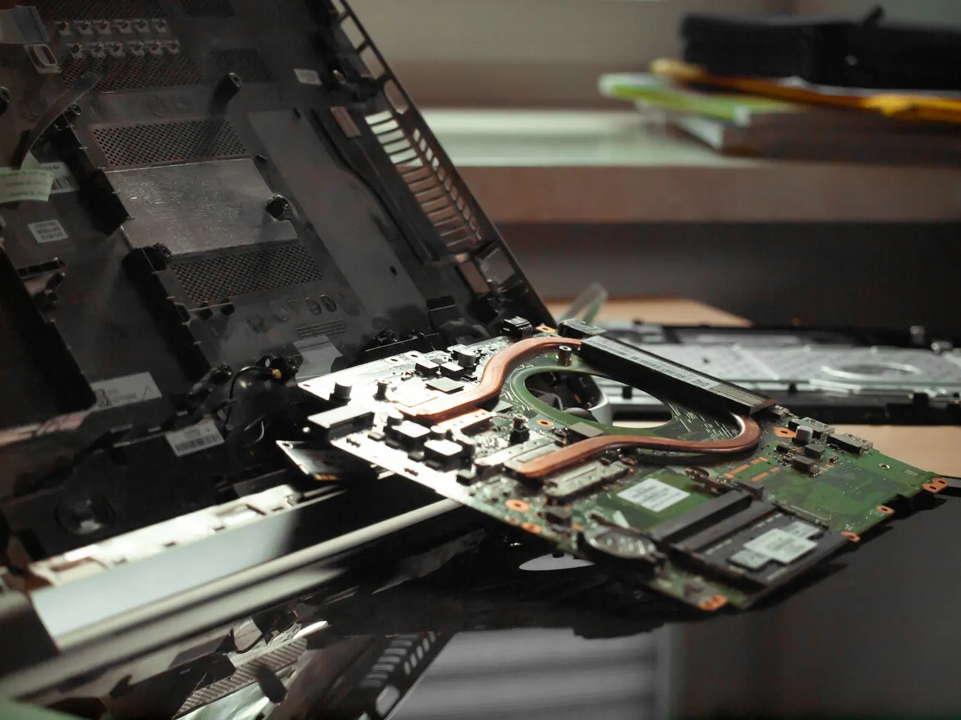 A laptop opened up showing internal components