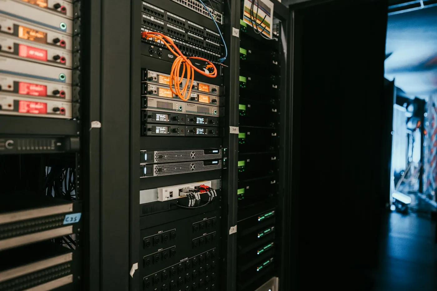 Rows of server racks in a data center