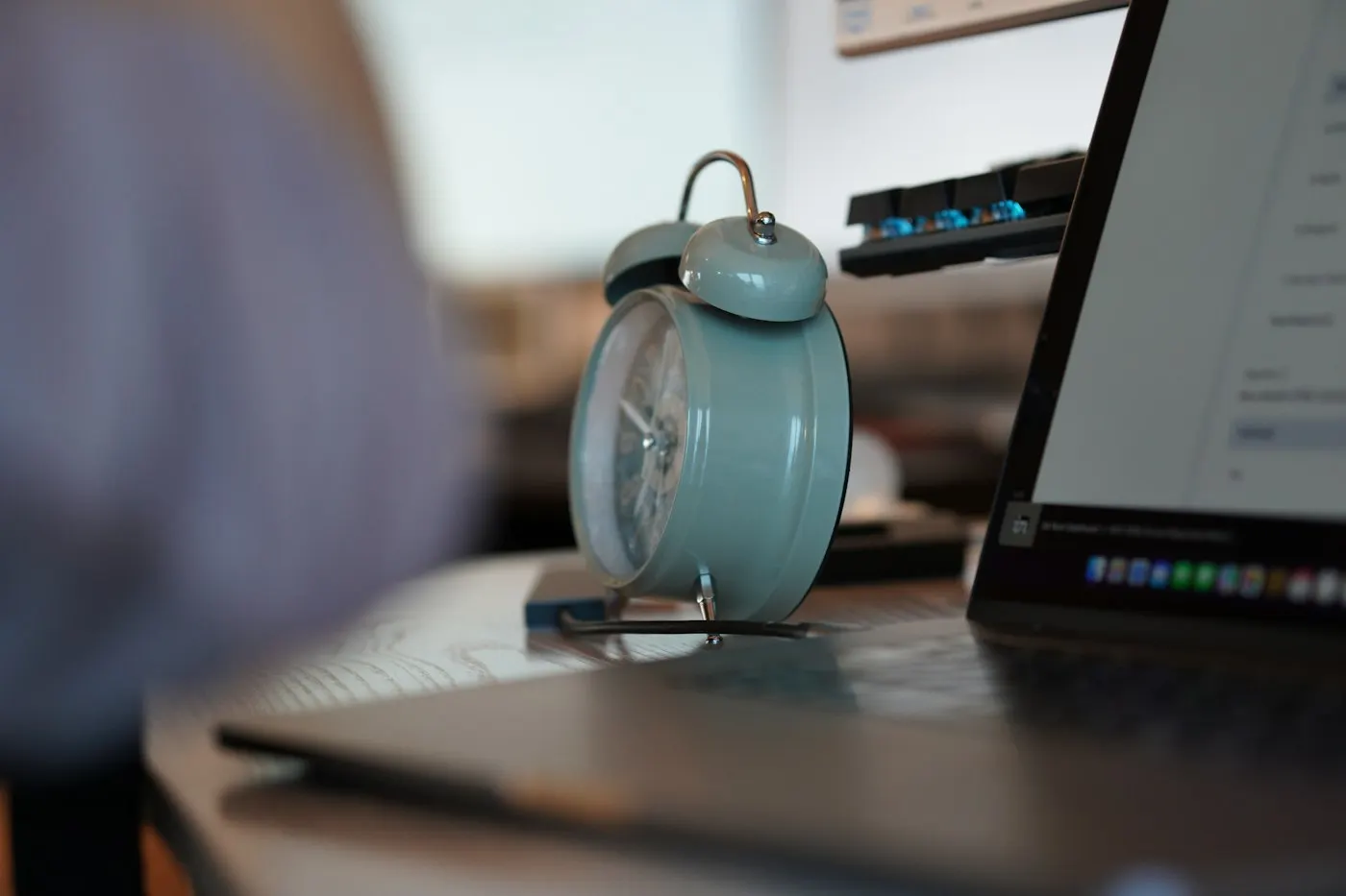 A stopwatch sitting on an office desk