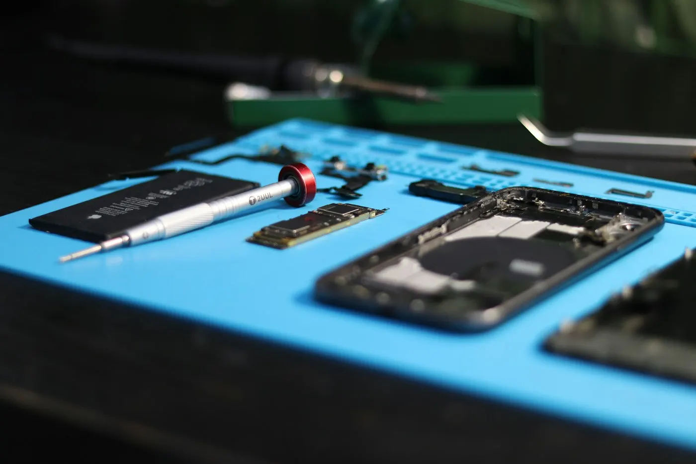 Close-up of tools used to repair a smartphone