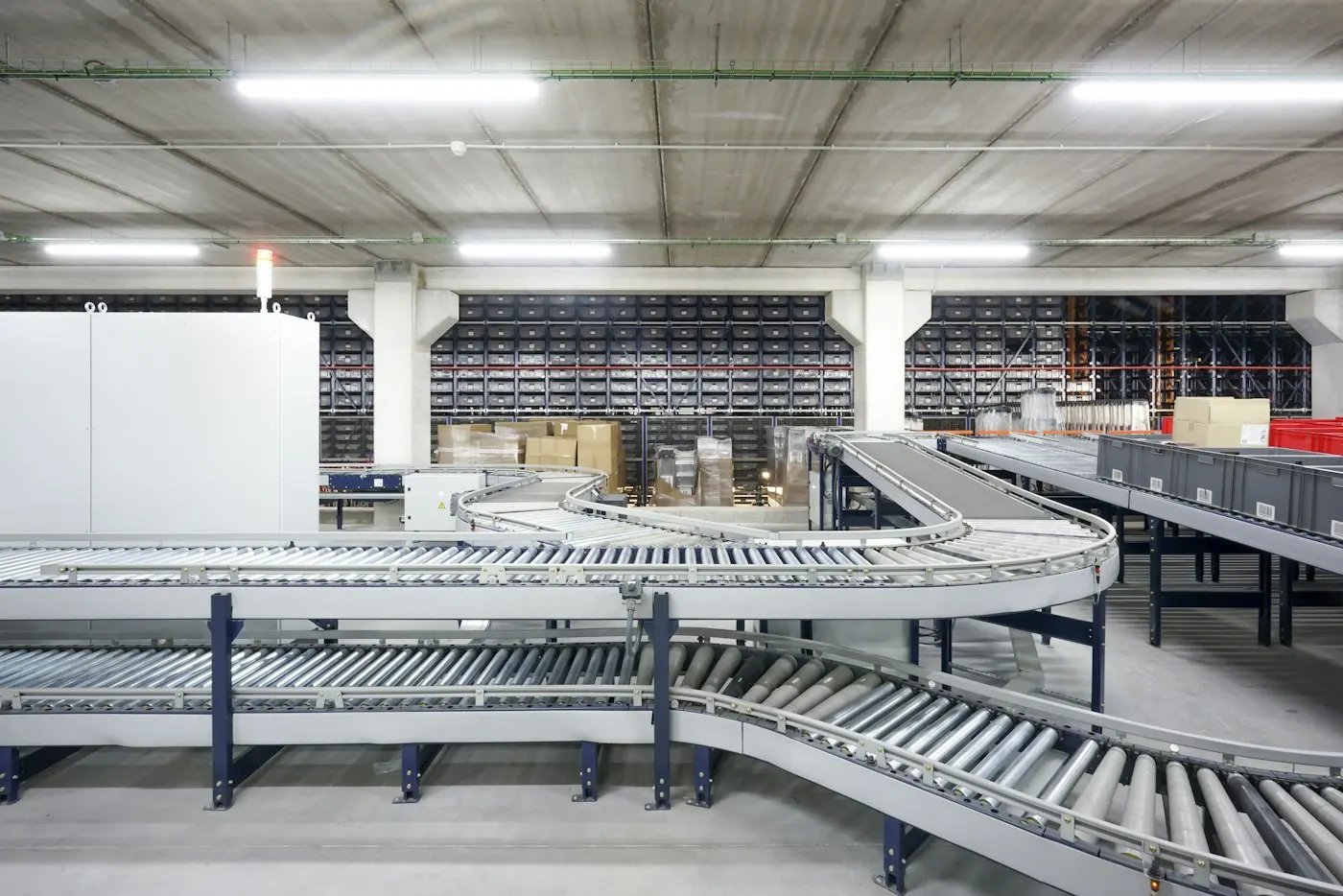 Boxes moving along a warehouse conveyor belt