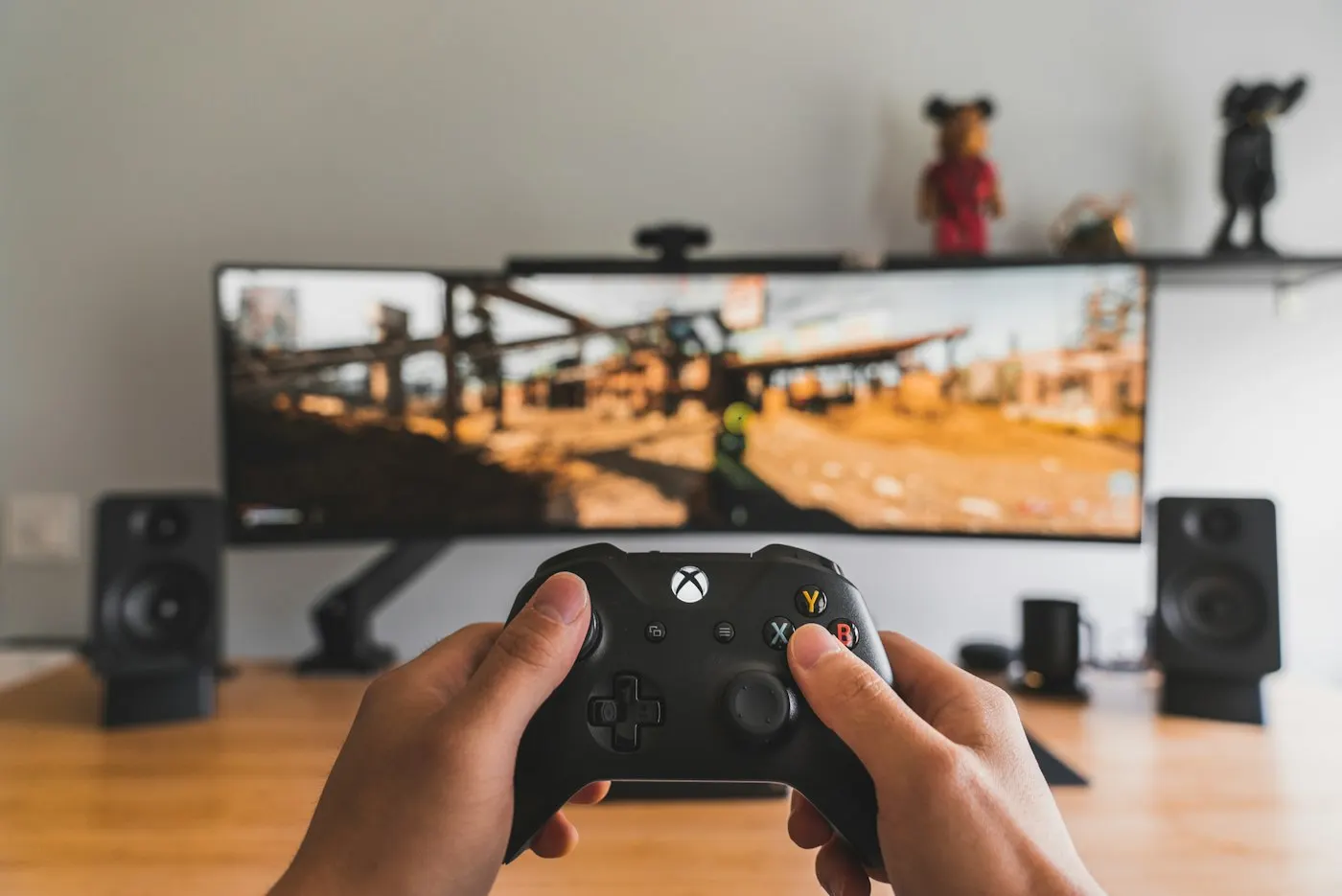 A person playing a game on a desktop computer