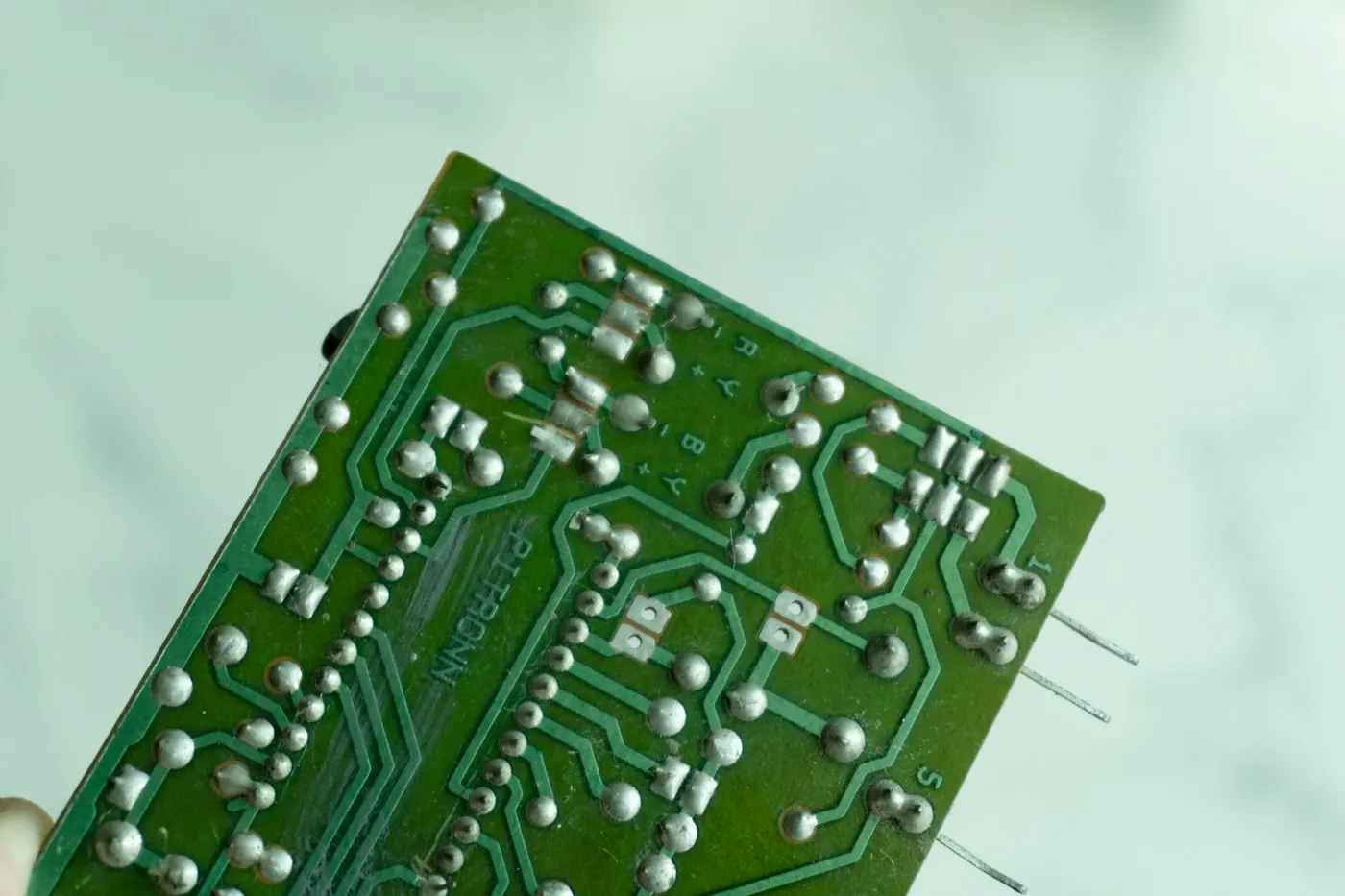 A padlock resting on a circuit board representing digital security