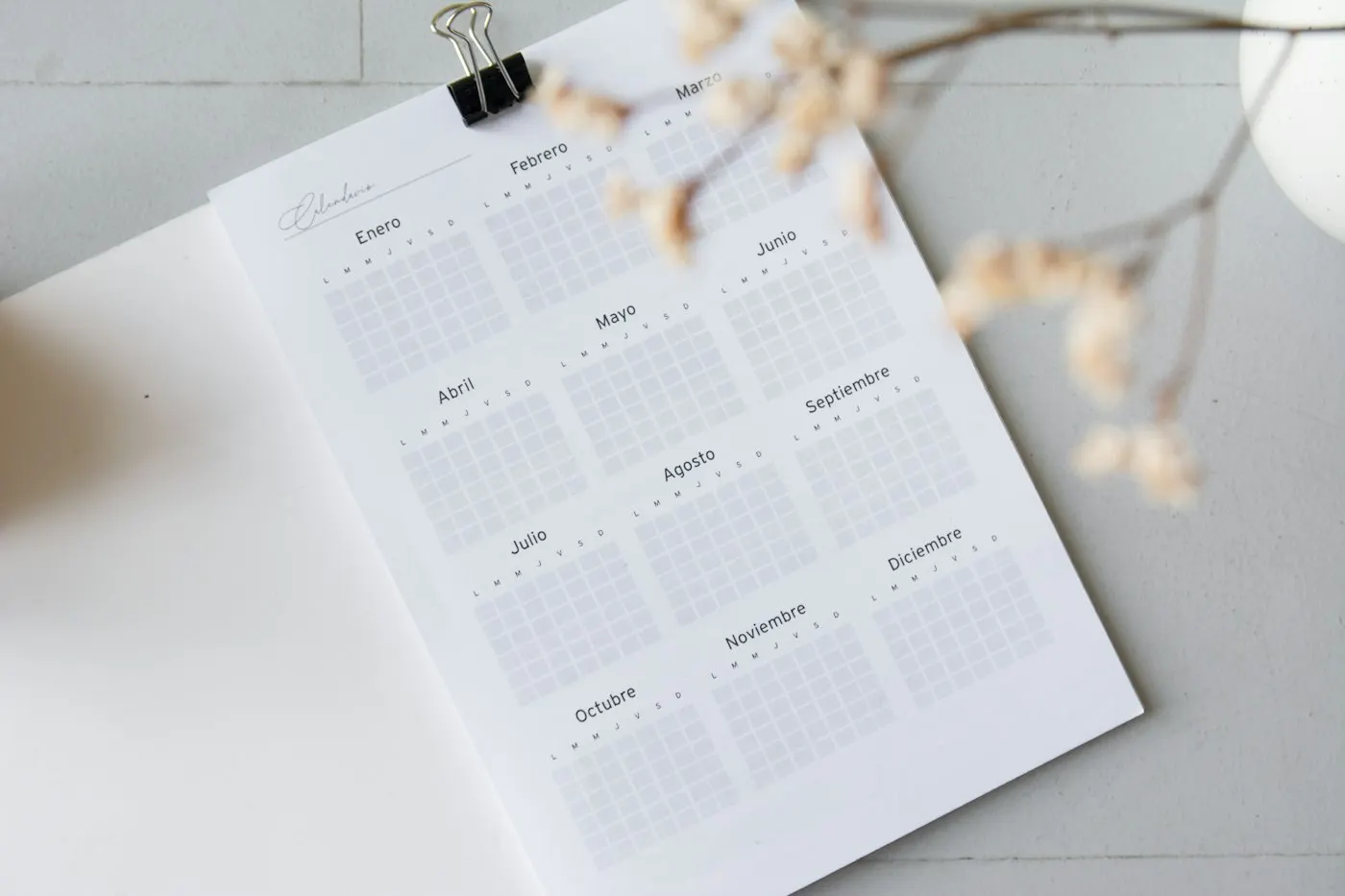 Calendar pages on a desk suggesting a yearly schedule