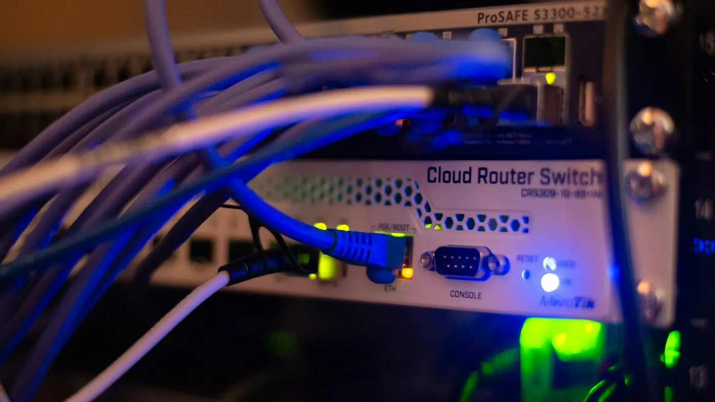 Tangled network cables inside a data center