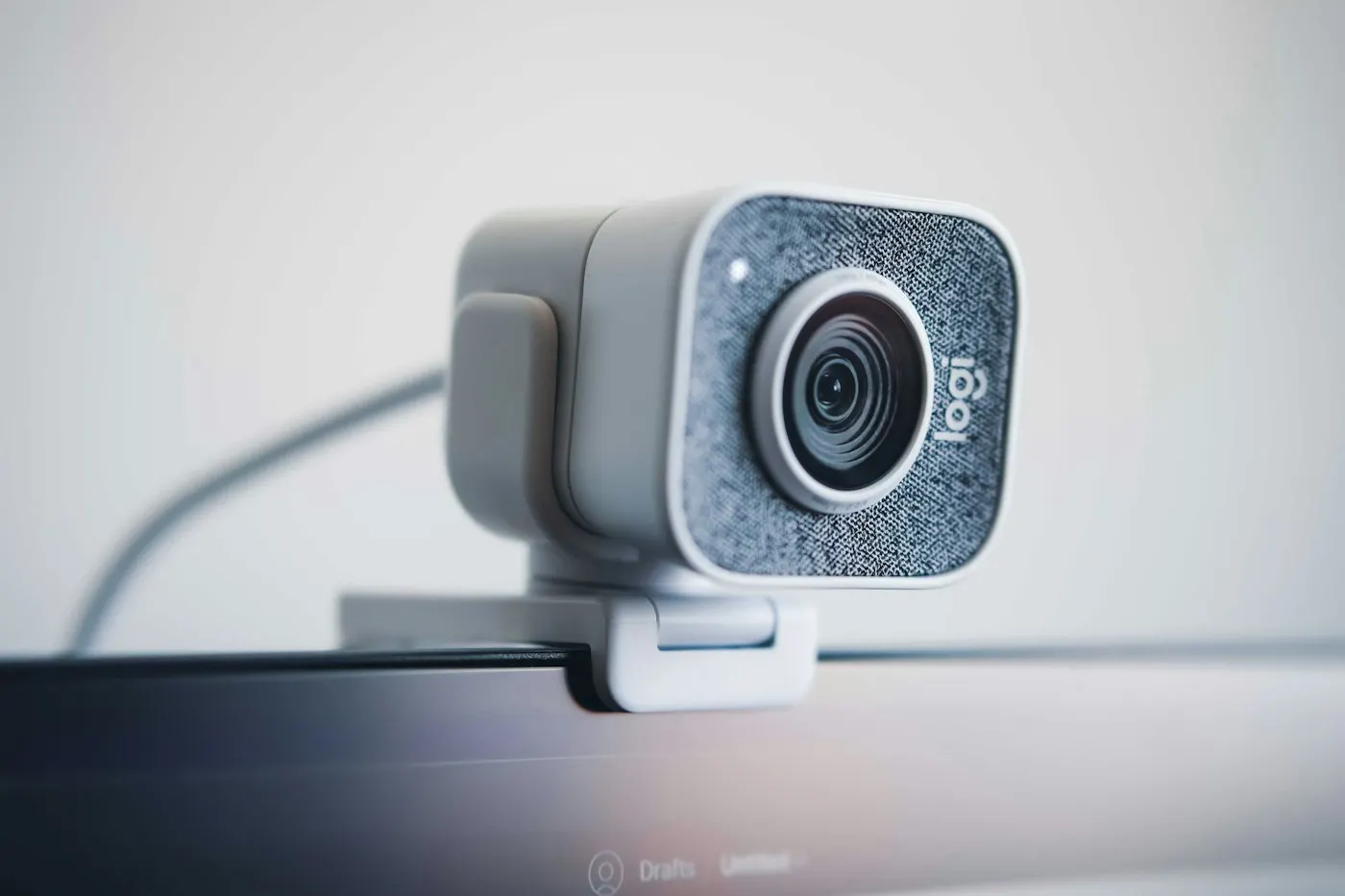 A webcam mounted on top of a computer monitor