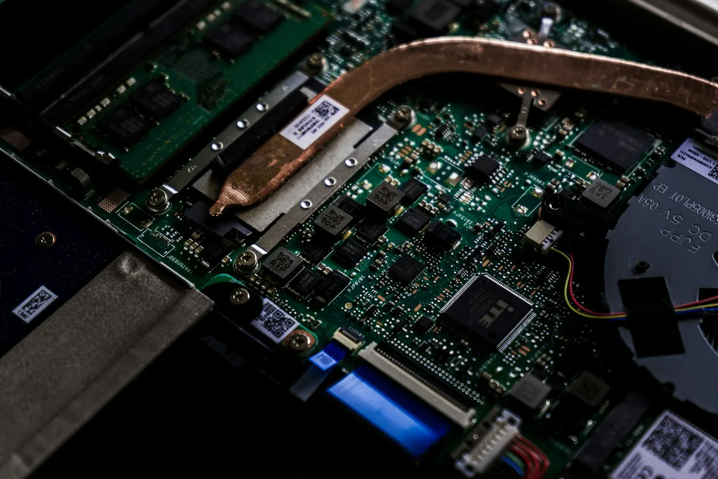 RAM memory sticks installed on a laptop motherboard