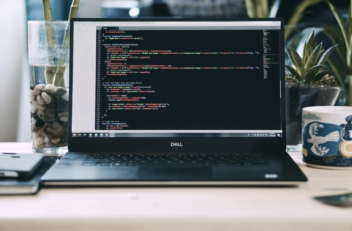 A laptop screen showing a text editor with plain text files