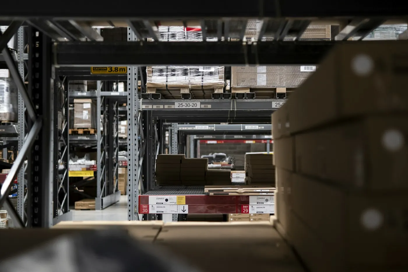 Boxes moving along a warehouse conveyor belt
