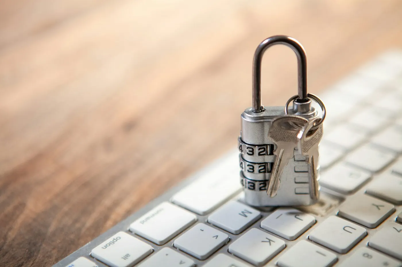 Digital padlock icon overlaid on a screen of code