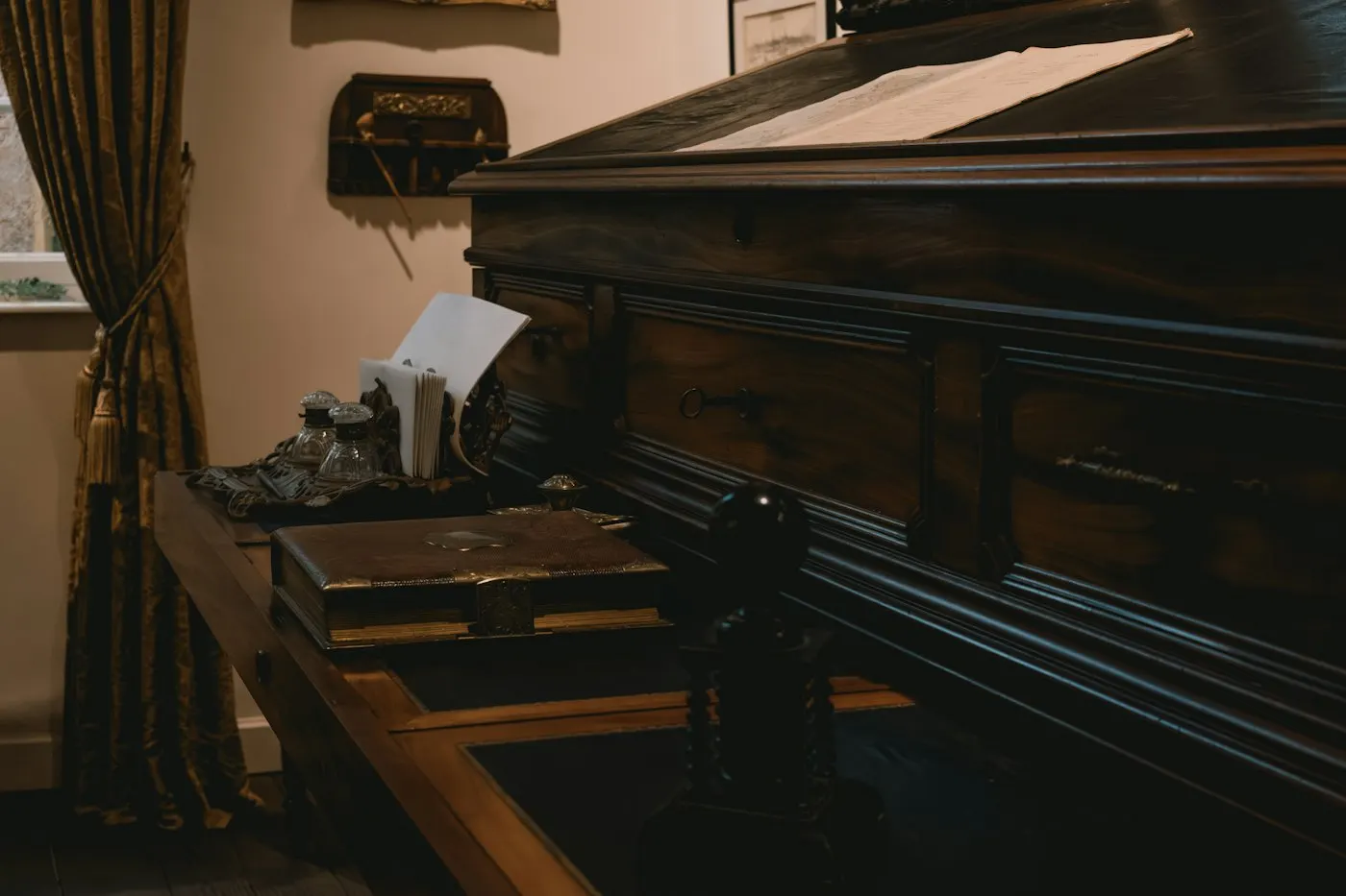 A gavel resting on a wooden desk