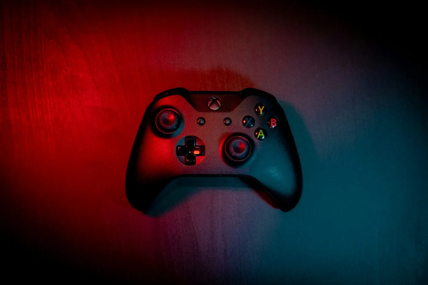 Close-up of a video game controller in hand