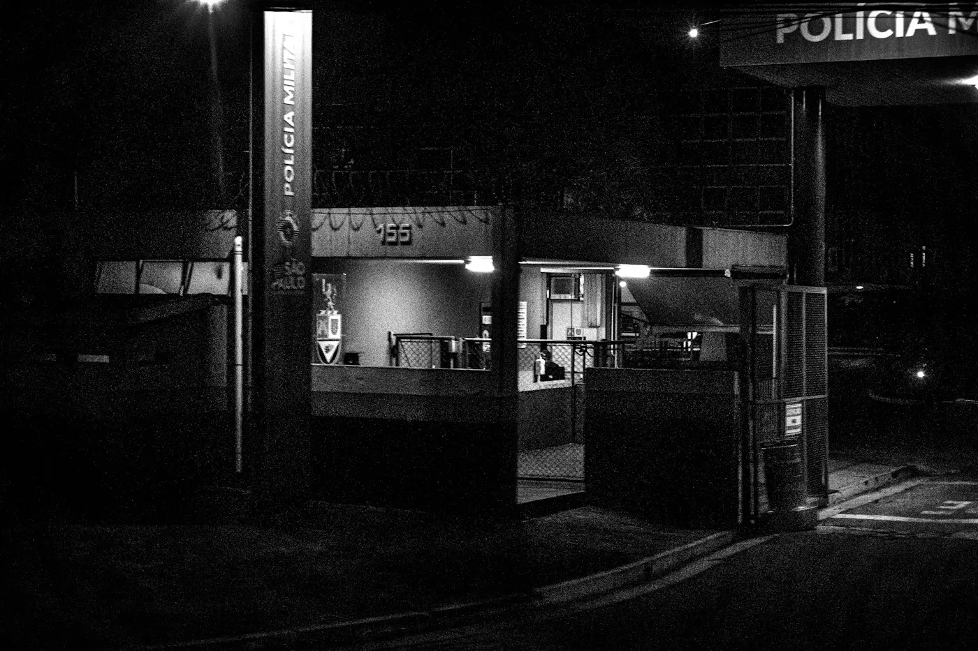 A city police station building at night
