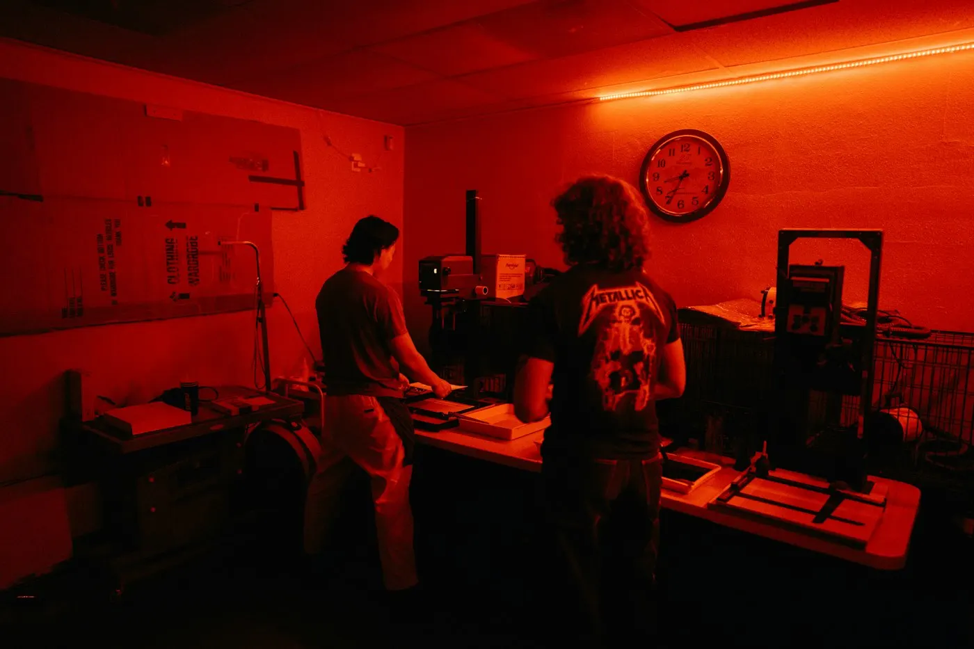 A red warning light glowing in a dark room