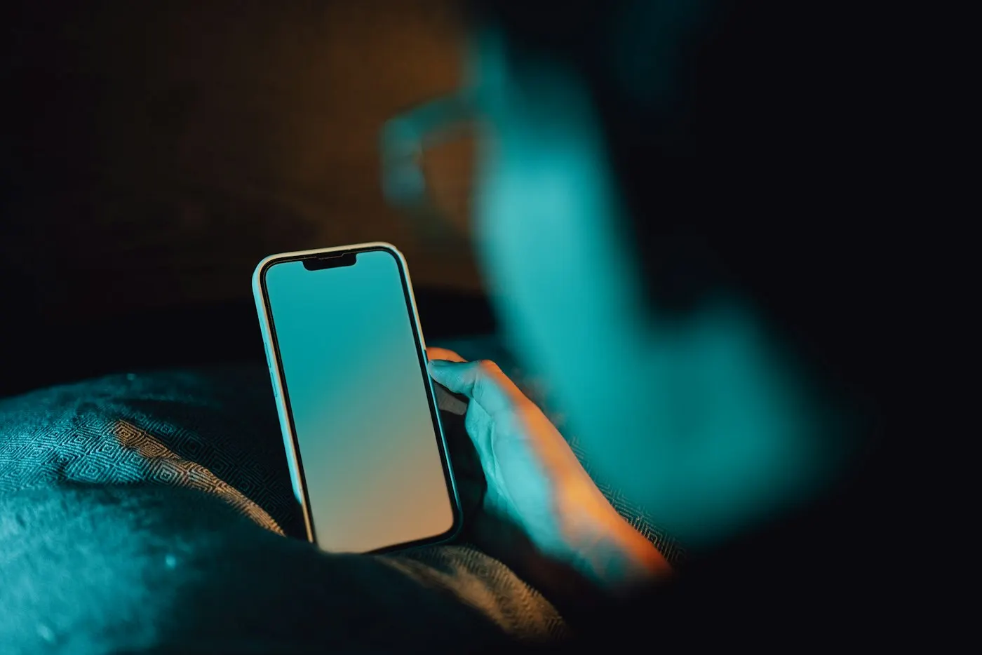 Person reviewing a notification on a phone screen